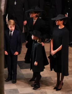 100556326-britains-catherine-2l-princess-of-wales-meghan-r-duchess-of-sussex-prince-george-l-an